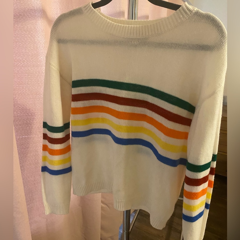 White sweater with rainbow stripe